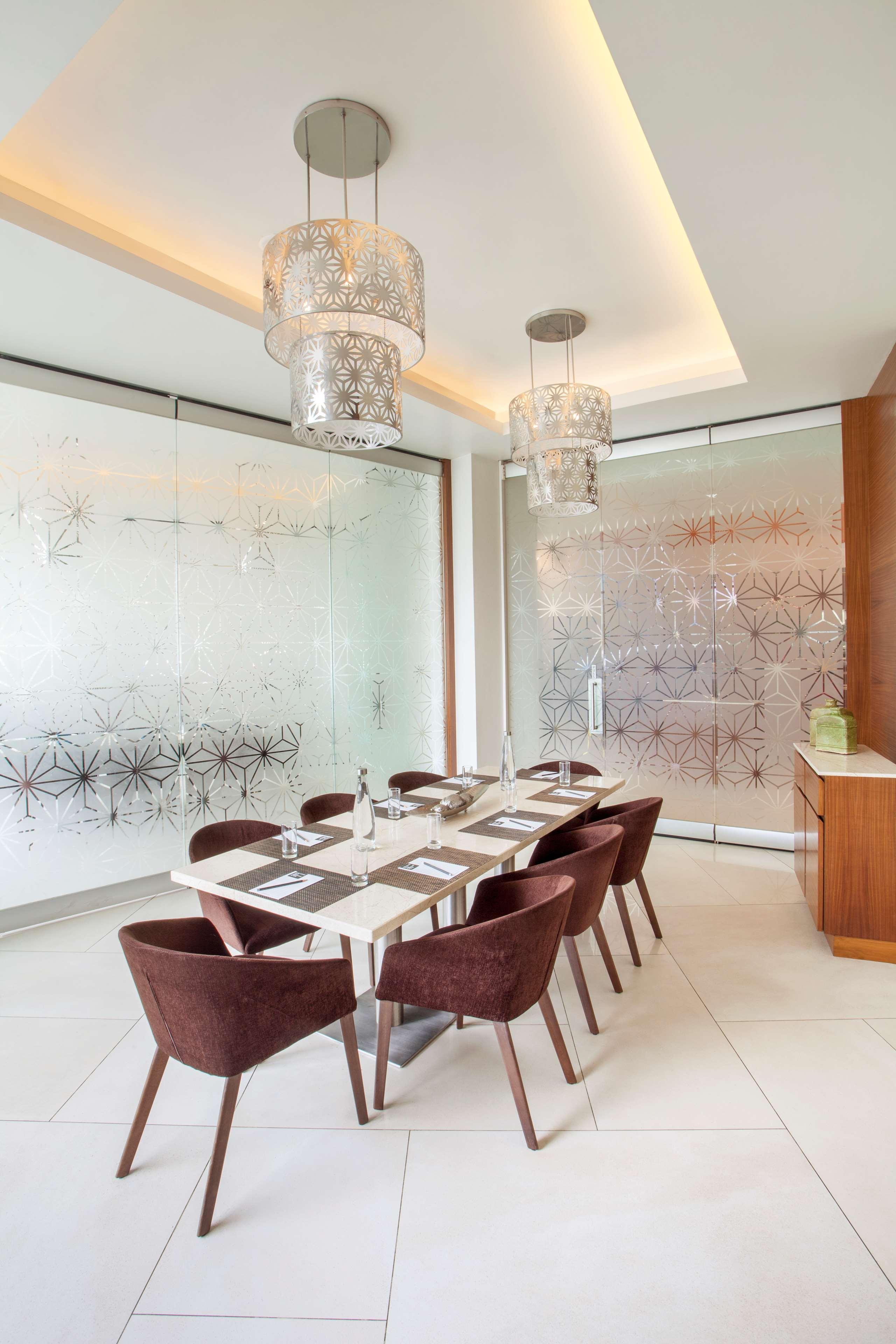 Hyatt Place Hyderabad Banjara Hills Exterior photo A private dining room at the restaurant