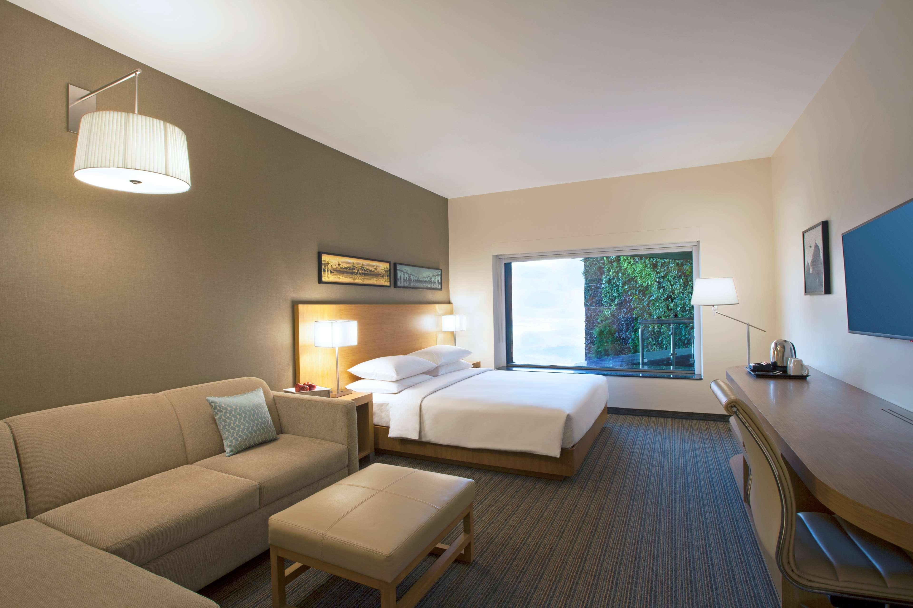 Hyatt Place Hyderabad Banjara Hills Exterior photo A typical room at the Hotel Maya